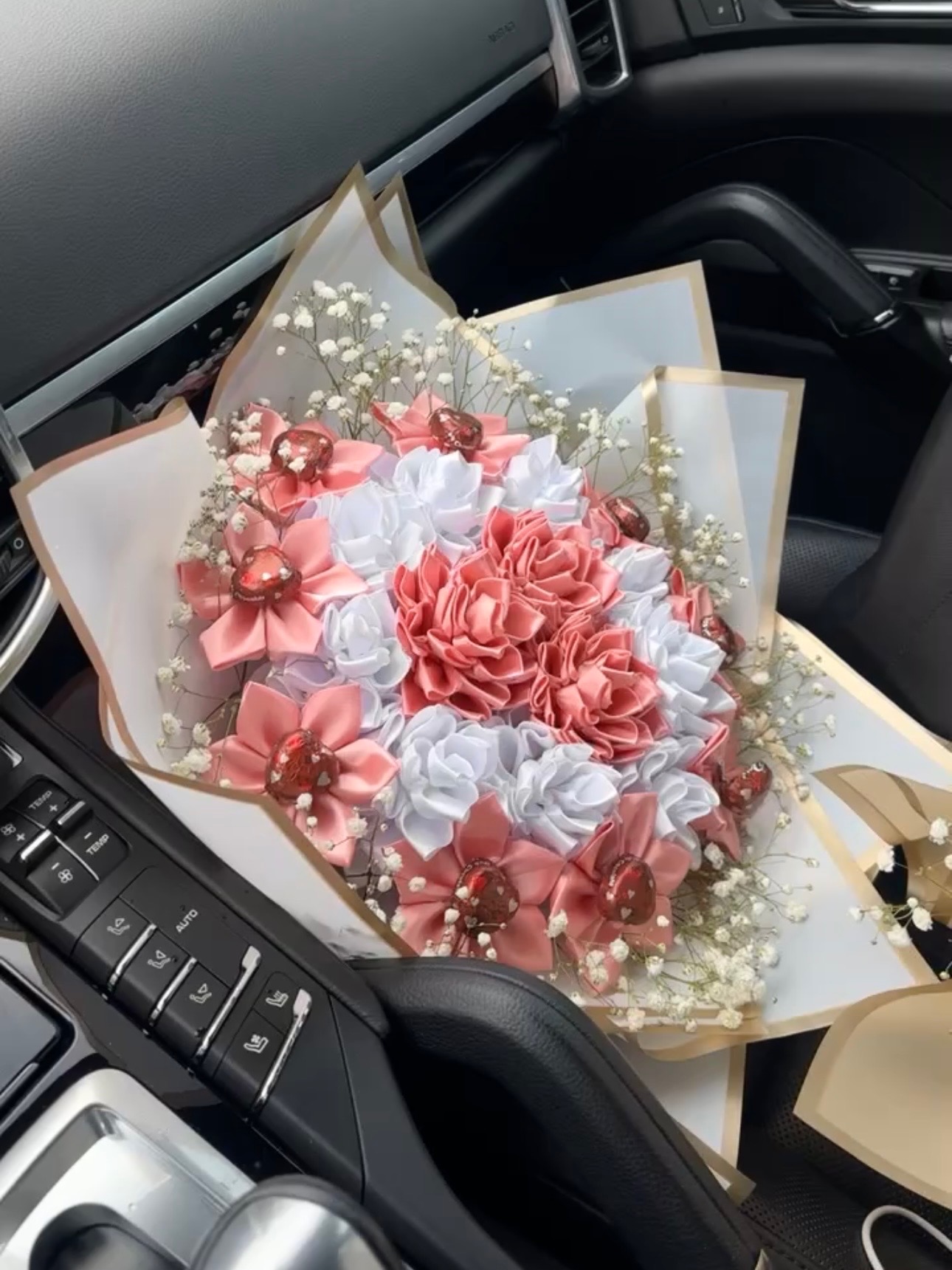 Pink ribbon roses bouquet with chocolate hearts